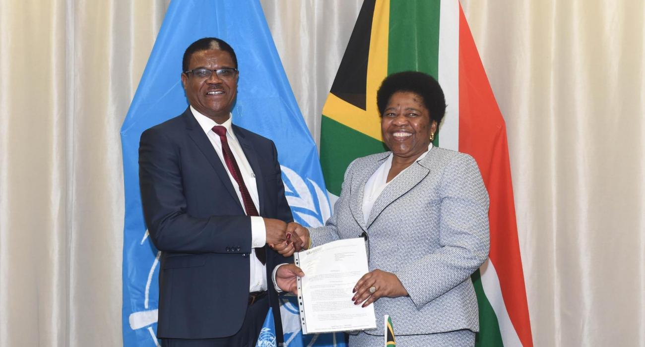 Dr Owen Kaluwa, the World Health Organization Representative in South Africa presenting his credentials to the Deputy Minister of International Relations and Cooperation, Ms Candith Mashego-Dlamini.